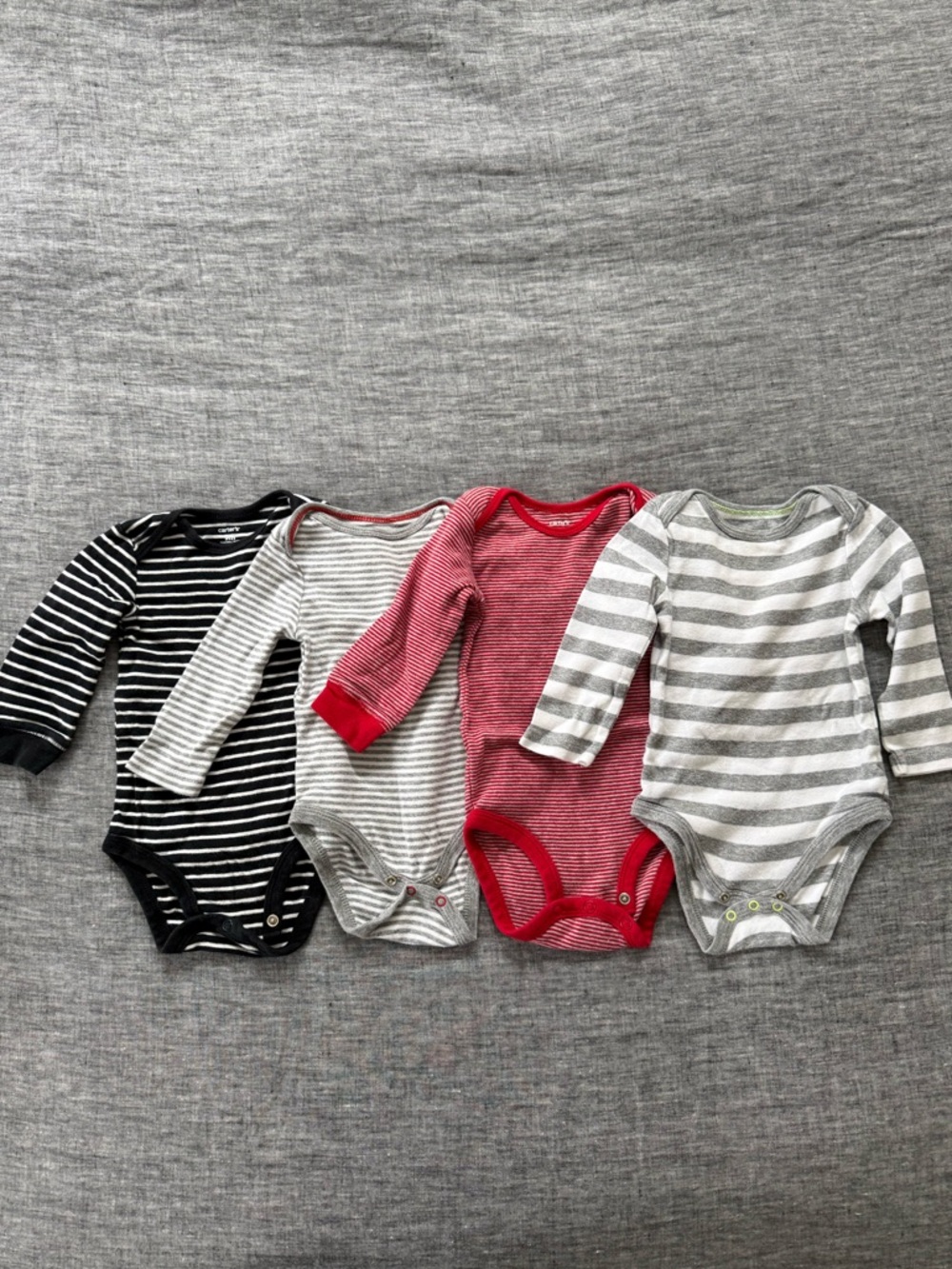 Carter’s/Cat & Jack striped onesie bundle